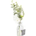 Vase en verre transparent avec eucalyptus et fleurs blanches  ATMOSPHERA