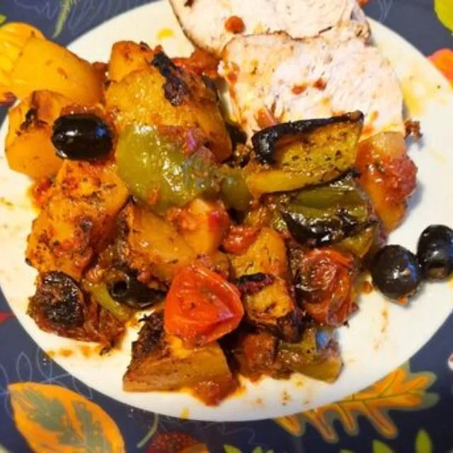 Rôti de dinde aux olives noires et aux petits légumes